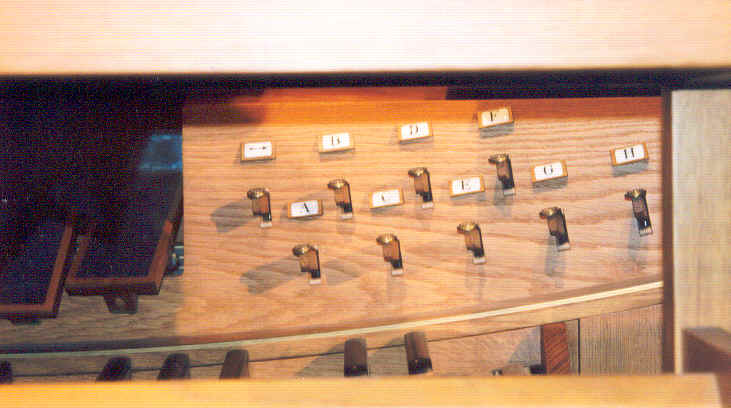Control levers above pedals (right side)